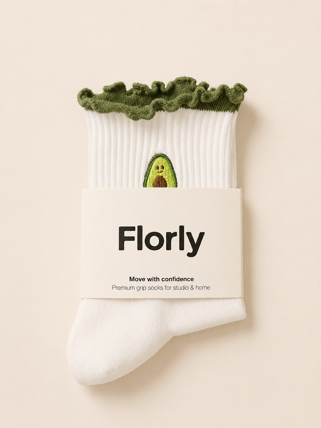 Close-up of Avocado Flow grip socks showing the non-slip grip sole