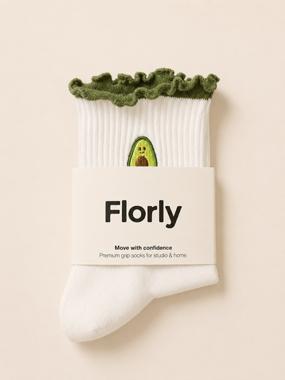 Close-up of Avocado Flow grip socks showing the non-slip grip sole