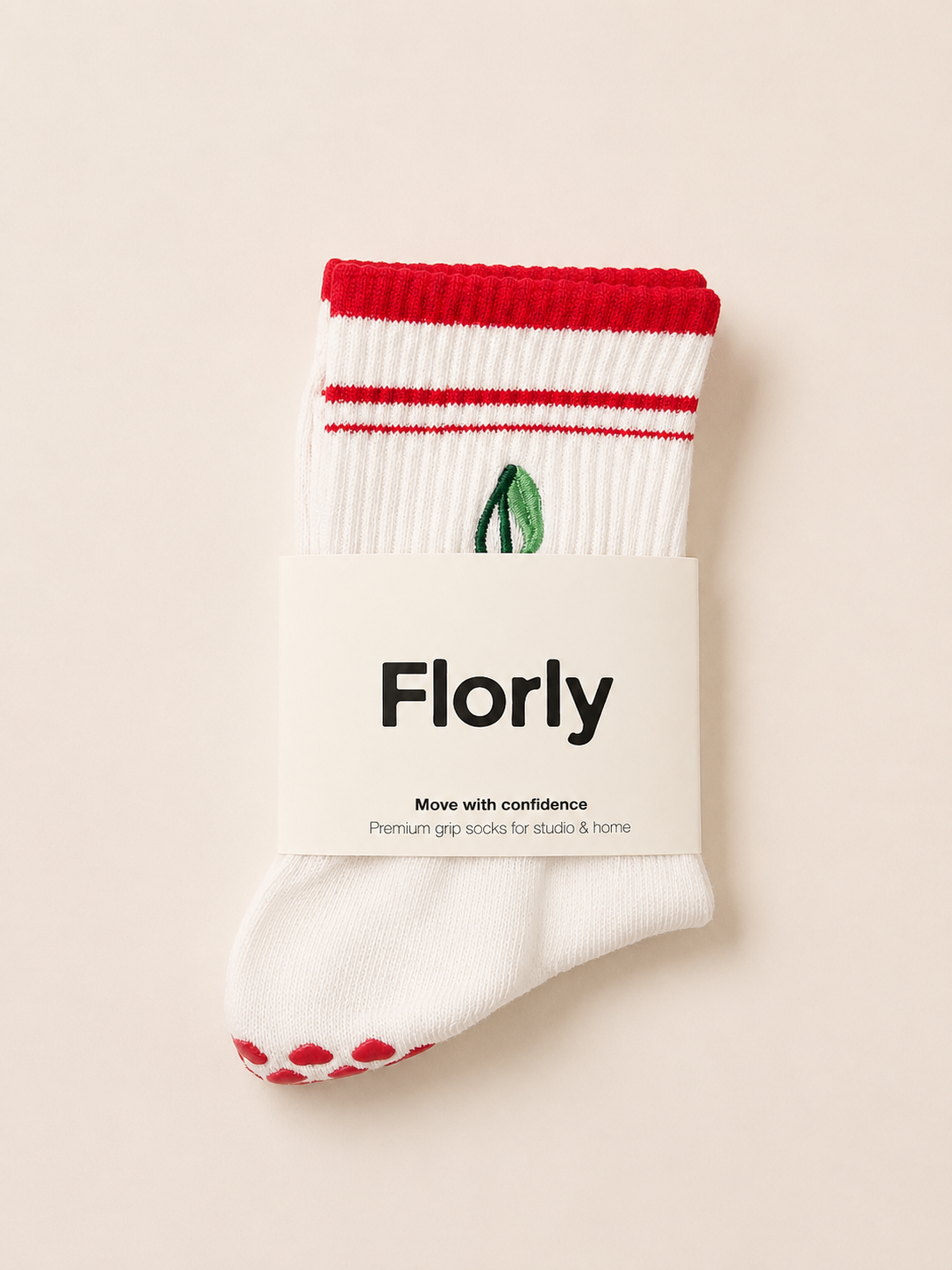 Close-up of Cherry Bliss grip socks showing the non-slip grip sole