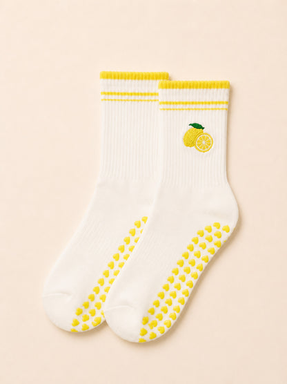 Lemon Glow pilates grip socks with ruffle edge and lemon print