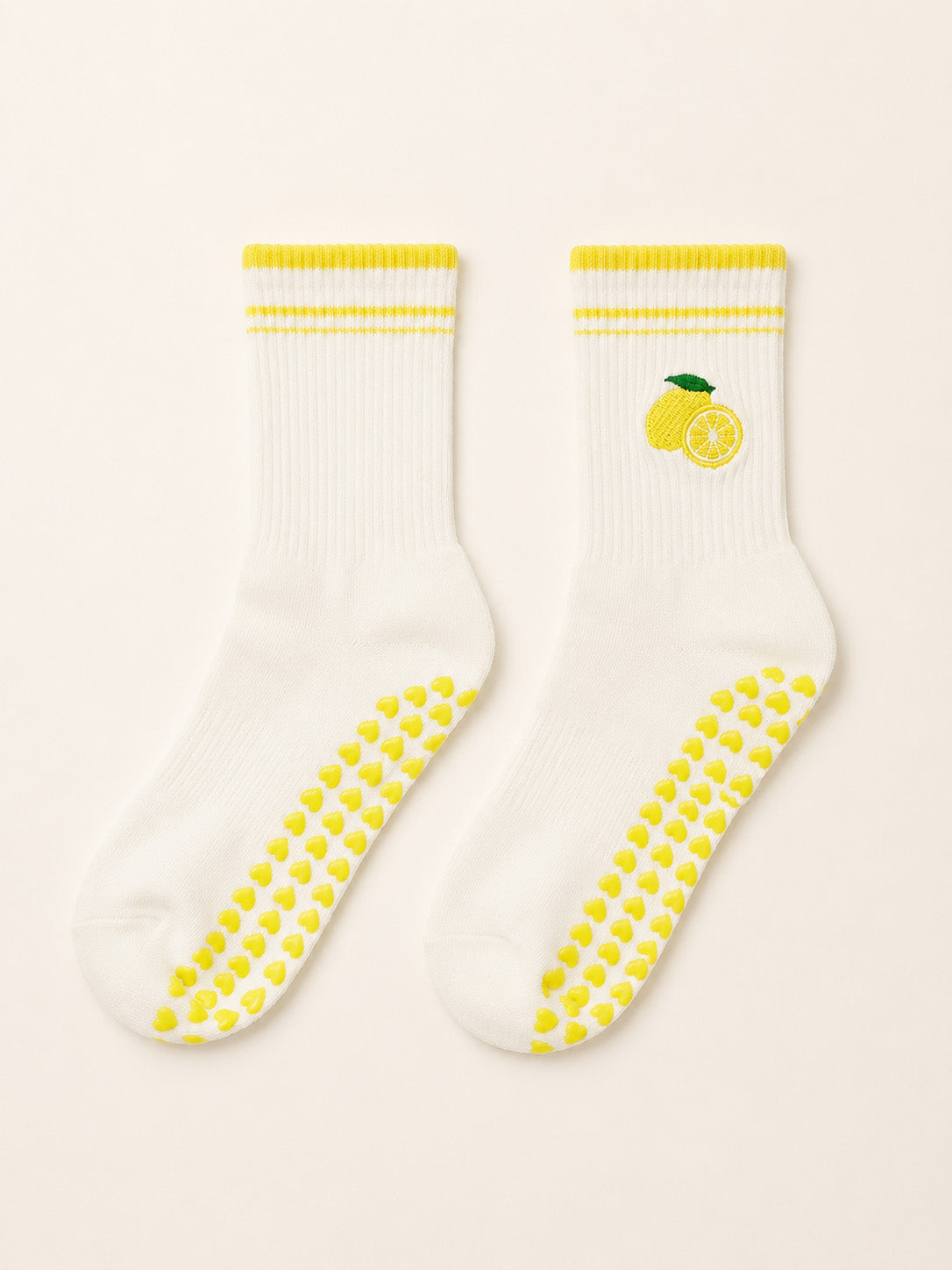 Lemon Glow ruffle grip socks worn for pilates at home
