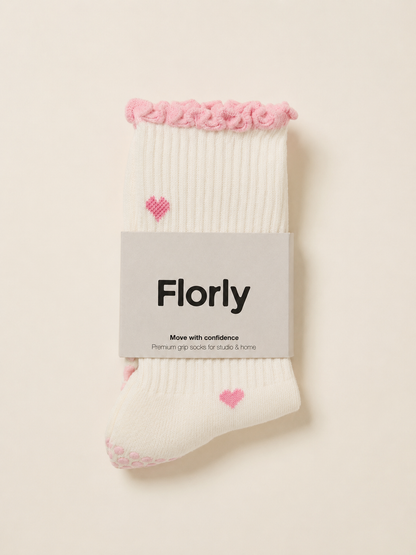 Close-up of Little Love grip socks showing the non-slip grip sole