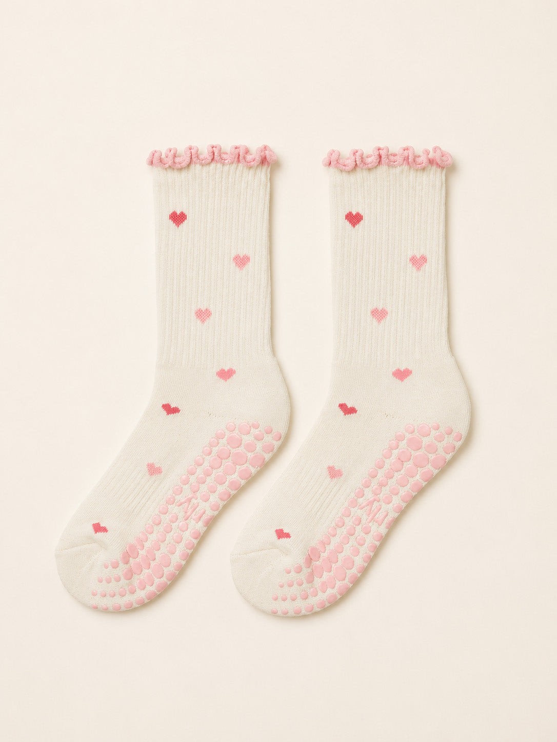 Little Love ruffle grip socks worn for a pilates session at home