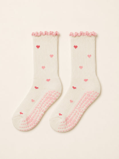 Little Love ruffle grip socks worn for a pilates session at home